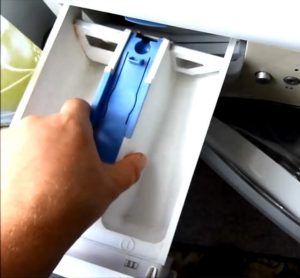 Как да премахнете тавата за прах от пералня Beko?