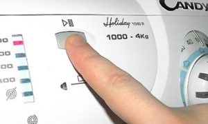 Как да включите пералня Kandy?